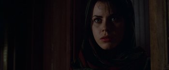 Movie still from “The Island of Dr. Moreau” (1996), directed by Richard Stanley – A person wearing a hood; Close Up shot, Low angle