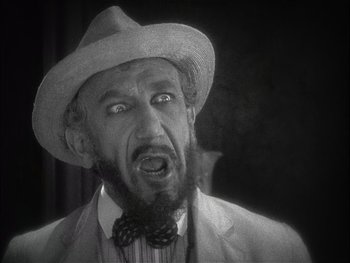 Movie still from “The Jazz Singer” (1927), directed by Alan Crosland – An old man with a beard and a hat; Close Up shot, Low angle