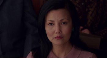 Movie still from “The Joy Luck Club” (1993), directed by Wayne Wang – A person with long black hair; Close Up shot, High angle