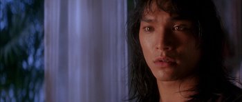 Movie still from “The Jungle Book” (1994), directed by Stephen Sommers – A person with long hair; Close Up shot, Low angle