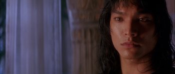 Movie still from “The Jungle Book” (1994), directed by Stephen Sommers – A person with wet hair; Close Up shot, Low angle