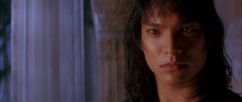 Movie still from “The Jungle Book” (1994), directed by Stephen Sommers – A person with wet hair; Close Up shot, Low angle