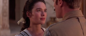 Movie still from “The Jungle Book” (1994), directed by Stephen Sommers – A woman and a man looking at one another; Close Up shot, Over the shoulder angle