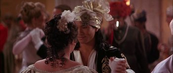 Movie still from “The Jungle Book” (1994), directed by Stephen Sommers – A man and a woman dressed in renaissance garb; Close Up shot, Over the shoulder angle