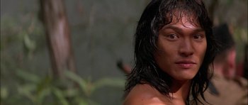 Movie still from “The Jungle Book” (1994), directed by Stephen Sommers – A person with wet hair; Close Up shot, Low angle