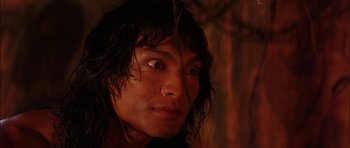 Movie still from “The Jungle Book” (1994), directed by Stephen Sommers – A person with wet hair; Close Up shot, Low angle