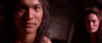 Movie still from “The Jungle Book” (1994), directed by Stephen Sommers – A person with long hair; Close Up shot, Low angle