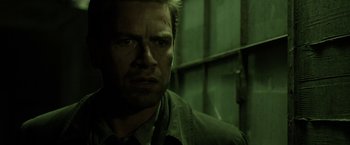 Movie still from “Department Q: The Keeper of Lost Causes” (2013), directed by Mikkel Nørgaard – A person wearing a shirt; Close Up shot, Low angle