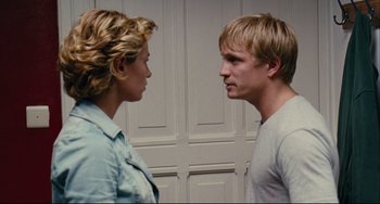 Movie still from “The Kid with a Bike” (2011), directed by Jean-Pierre Dardenne – A man and a woman facing each other in front of each other; Close Up shot, Over the shoulder angle