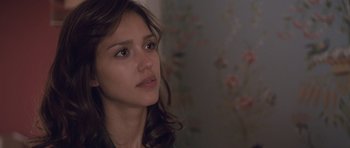 Movie still from “The Killer Inside Me” (2010), directed by Michael Winterbottom – A person with long brown hair; Close Up shot, Over the shoulder angle