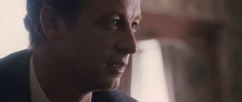 Movie still from “The Killer Inside Me” (2010), directed by Michael Winterbottom – A man's face in front of a window; Close Up shot, Over the shoulder angle