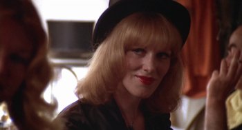 Movie still from “The Killing of a Chinese Bookie” (1976), directed by John Cassavetes – A person wearing a hat; Close Up shot, Low angle