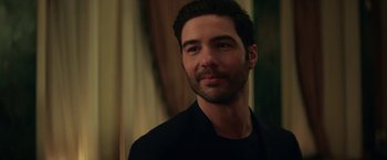 Movie still from “The Kindness of Strangers” (2019), directed by Lone Scherfig – A person wearing a black shirt; Close Up shot, Over the shoulder angle