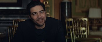 Movie still from “The Kindness of Strangers” (2019), directed by Lone Scherfig – A person sitting in a room; Close Up shot, Over the shoulder angle