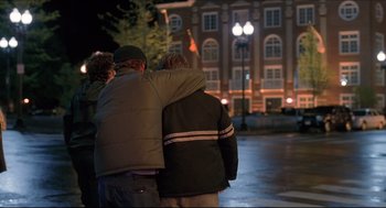 Movie still from “Good Will Hunting” (1997), directed by Gus Van Sant – Two people standing next to each other on the sidewalk; Medium shot, Over the shoulder angle