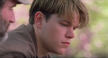 Movie still from “Good Will Hunting” (1997), directed by Gus Van Sant – A person wearing a brown shirt; Close Up shot, Low angle