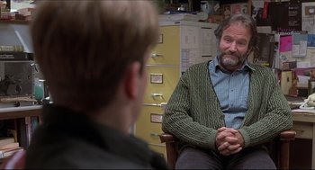 Movie still from “Good Will Hunting” (1997), directed by Gus Van Sant – An older man sitting in front of a younger man; Medium shot, Over the shoulder angle