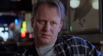 Movie still from “Good Will Hunting” (1997), directed by Gus Van Sant – A person wearing a shirt; Close Up shot, Low angle