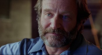 Movie still from “Good Will Hunting” (1997), directed by Gus Van Sant – A person with a beard; Close Up shot, Over the shoulder angle