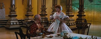 Movie still from “The King and I” (1956), directed by Walter Lang – A man and a woman dressed in medieval clothing; Medium shot, High angle