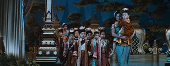 Movie still from “The King and I” (1956), directed by Walter Lang – A group of young children dressed in traditional costumes; Medium shot, Low angle