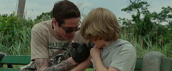 Movie still from “The King of Staten Island” (2020), directed by Judd Apatow – A man and a boy looking at each other; Close Up shot, Low angle