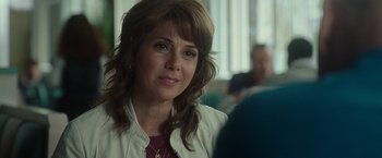 Movie still from “The King of Staten Island” (2020), directed by Judd Apatow – A person sitting in front of a window; Close Up shot, Over the shoulder angle