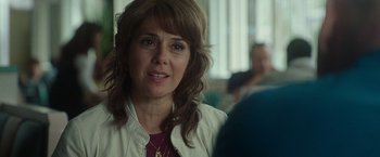 Movie still from “The King of Staten Island” (2020), directed by Judd Apatow – A person wearing a white jacket; Close Up shot, Over the shoulder angle