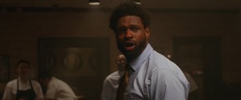 Movie still from “The King of Staten Island” (2020), directed by Judd Apatow – A person wearing a shirt and a tie; Close Up shot, Low angle