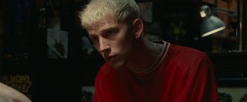 Movie still from “The King of Staten Island” (2020), directed by Judd Apatow – A person wearing a red shirt; Close Up shot, Over the shoulder angle