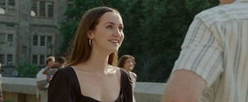Movie still from “The King of Staten Island” (2020), directed by Judd Apatow – A beautiful young lady standing next to some trees; Close Up shot, Over the shoulder angle