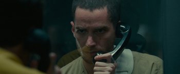 Movie still from “The King of Staten Island” (2020), directed by Judd Apatow – A person holding a cell phone; Close Up shot, Over the shoulder angle