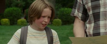 Movie still from “The King of Staten Island” (2020), directed by Judd Apatow – A young boy is talking to an older man; Close Up shot, Over the shoulder angle