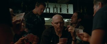 Movie still from “The King of Staten Island” (2020), directed by Judd Apatow – A group of men sitting around a table; Medium shot, High angle