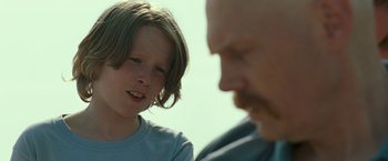 Movie still from “The King of Staten Island” (2020), directed by Judd Apatow – A boy and a man are talking to each other; Close Up shot, Over the shoulder angle