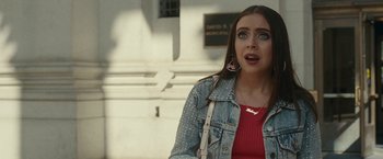Movie still from “The King of Staten Island” (2020), directed by Judd Apatow – A young woman is standing outside and looking surprised; Close Up shot, Over the shoulder angle
