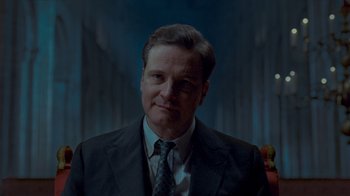 Movie still from “The King's Speech” (2010), directed by Tom Hooper – A person wearing a suit and tie; Close Up shot, Low angle