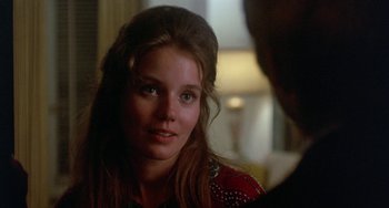 Movie still from “The Landlord” (1970), directed by Hal Ashby – A woman in a red shirt is talking to a man; Close Up shot, Over the shoulder angle