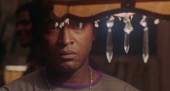 Movie still from “The Landlord” (1970), directed by Hal Ashby – A person wearing a hat; Close Up shot, Low angle