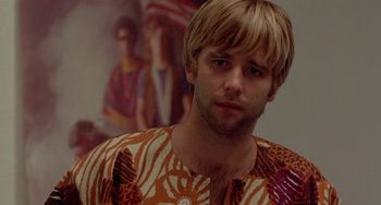 Movie still from “The Landlord” (1970), directed by Hal Ashby – A person wearing a shirt; Close Up shot, Over the shoulder angle