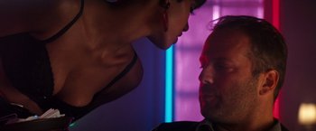 Movie still from “The Last Boy Scout” (1991), directed by Tony Scott – A man and a woman are looking at each other; Close Up shot, Over the shoulder angle