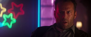 Movie still from “The Last Boy Scout” (1991), directed by Tony Scott – A person wearing a shirt and tie; Close Up shot, Low angle