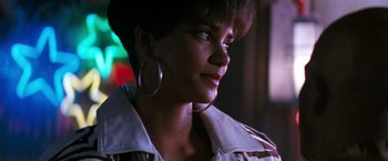 Movie still from “The Last Boy Scout” (1991), directed by Tony Scott – A person wearing a jacket; Close Up shot, Over the shoulder angle
