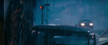 Movie still from “The Last Boy Scout” (1991), directed by Tony Scott – A view from inside a car of a traffic light and street lights; Wide shot, Low angle