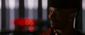 Movie still from “The Last Boy Scout” (1991), directed by Tony Scott – A person wearing a hat; Close Up shot, Low angle