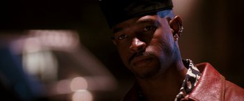 Movie still from “The Last Boy Scout” (1991), directed by Tony Scott – A person wearing a hat; Close Up shot, Low angle