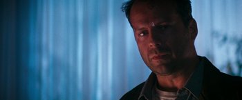 Movie still from “The Last Boy Scout” (1991), directed by Tony Scott – A person wearing a jacket; Close Up shot, Low angle