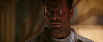 Movie still from “The Last Boy Scout” (1991), directed by Tony Scott – A person with his eyes wide open; Close Up shot, Low angle