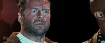 Movie still from “The Last Boy Scout” (1991), directed by Tony Scott – A person with his eyes wide open; Close Up shot, Low angle