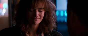 Movie still from “The Last Boy Scout” (1991), directed by Tony Scott – A person with long hair; Close Up shot, Over the shoulder angle